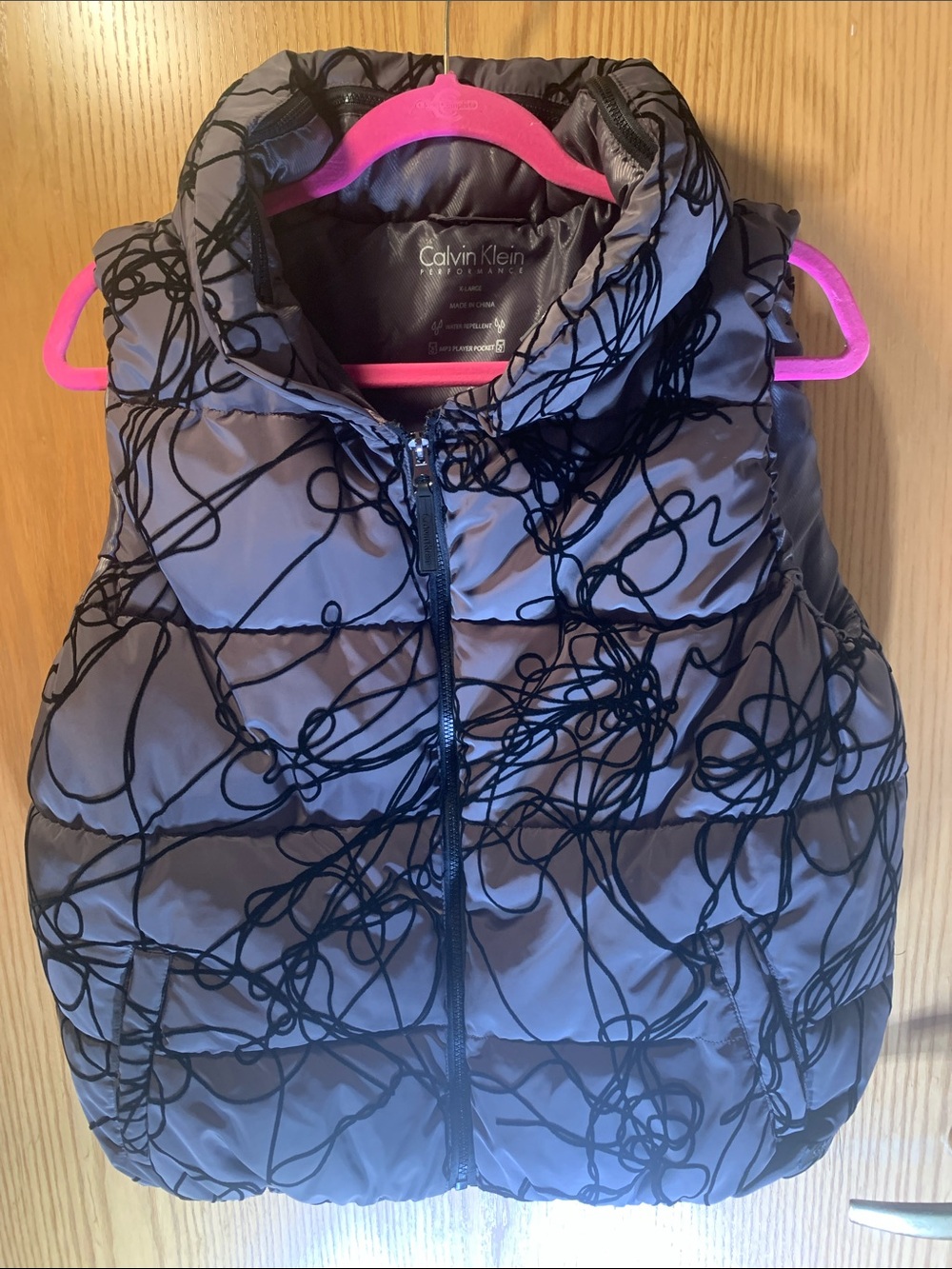 Calvin Klein Women’s Gray Puffer Vest with Black Scribble Design - Size XL